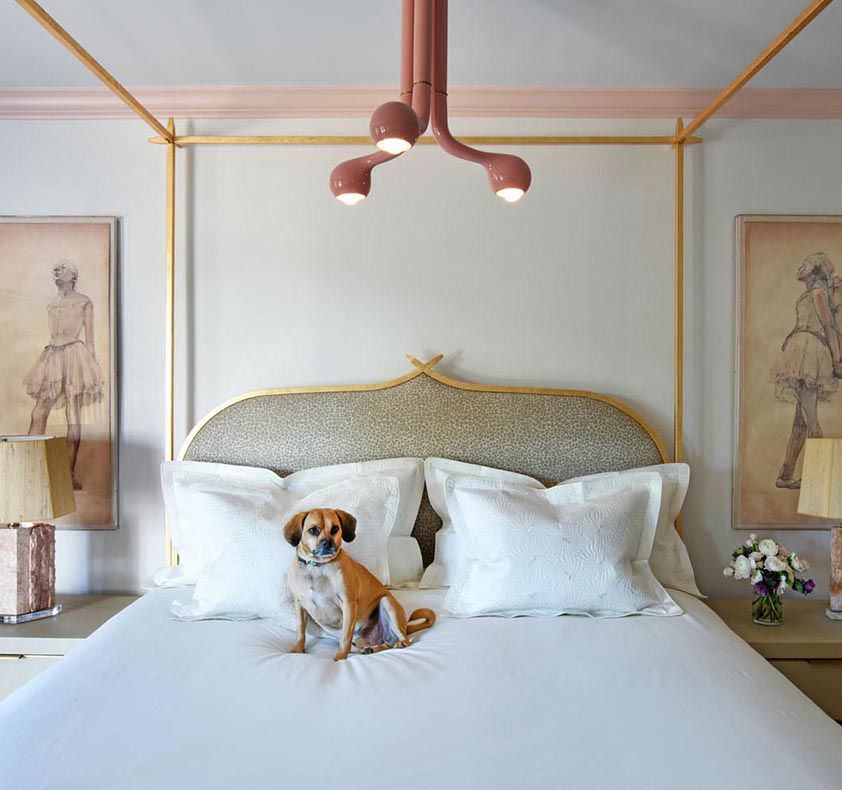 Gray bedroom with pink modernist chandelier and Degas artwork