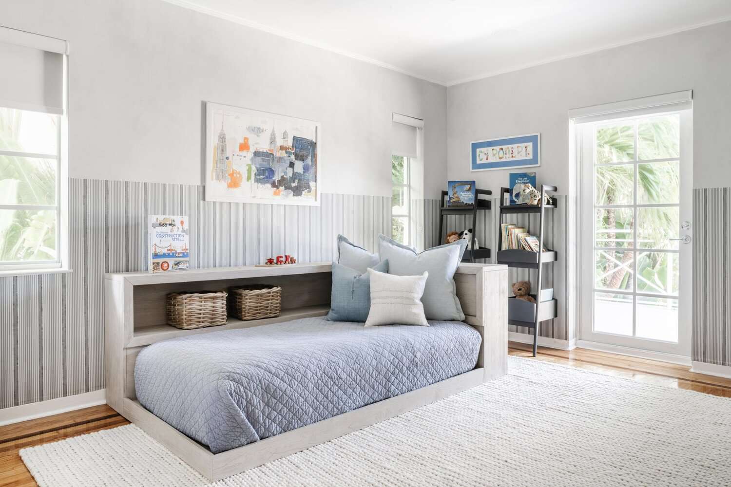 Gray kids' bedroom with blue furniture 
