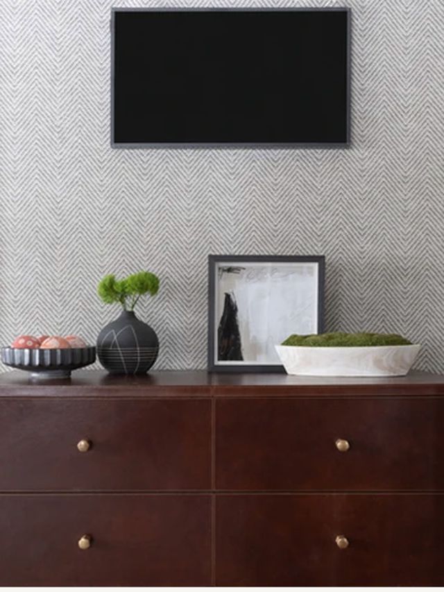 Gray walls with brown dresser