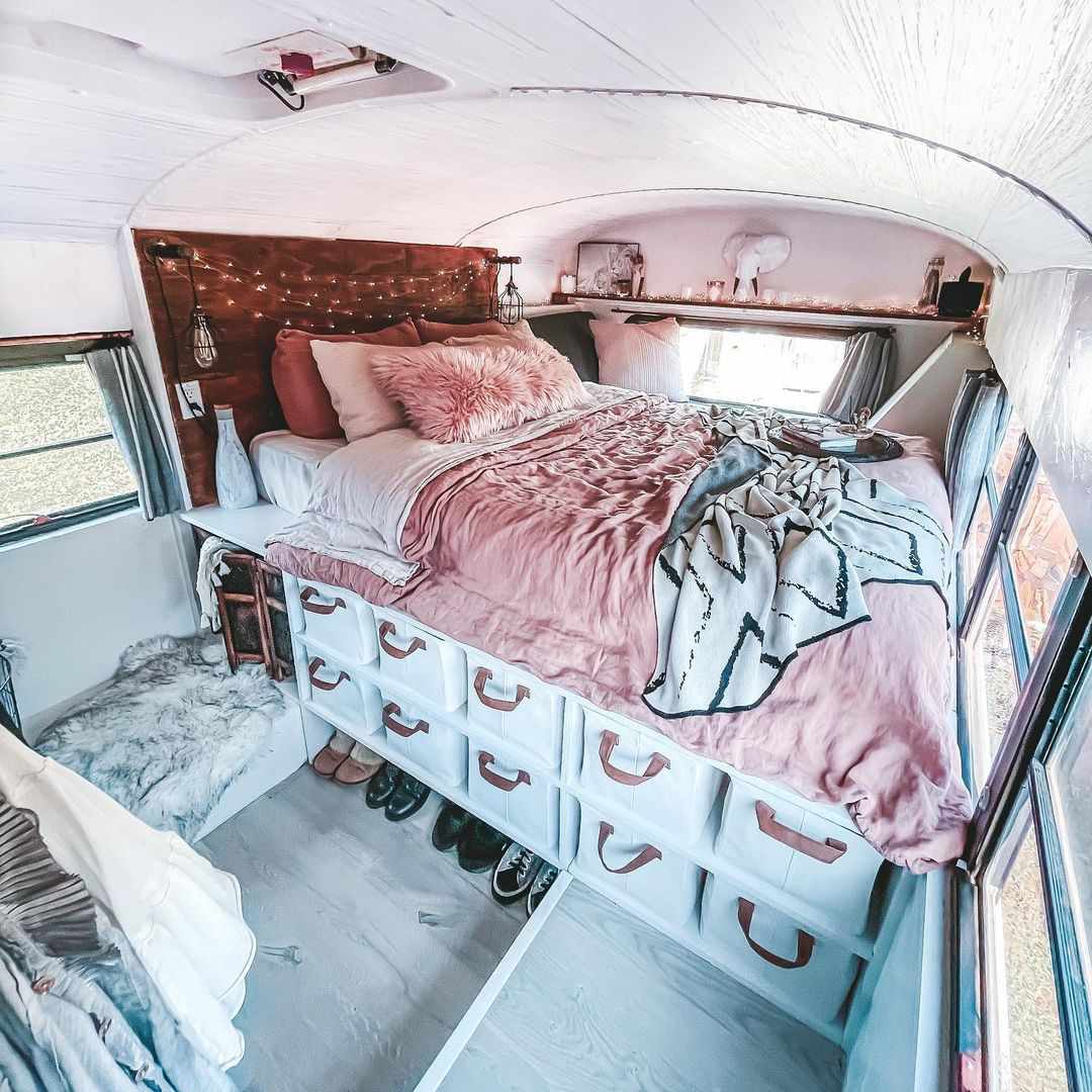 tiny home storage ideas, pink bedpread, drawers, baskets, van life, tiny home
