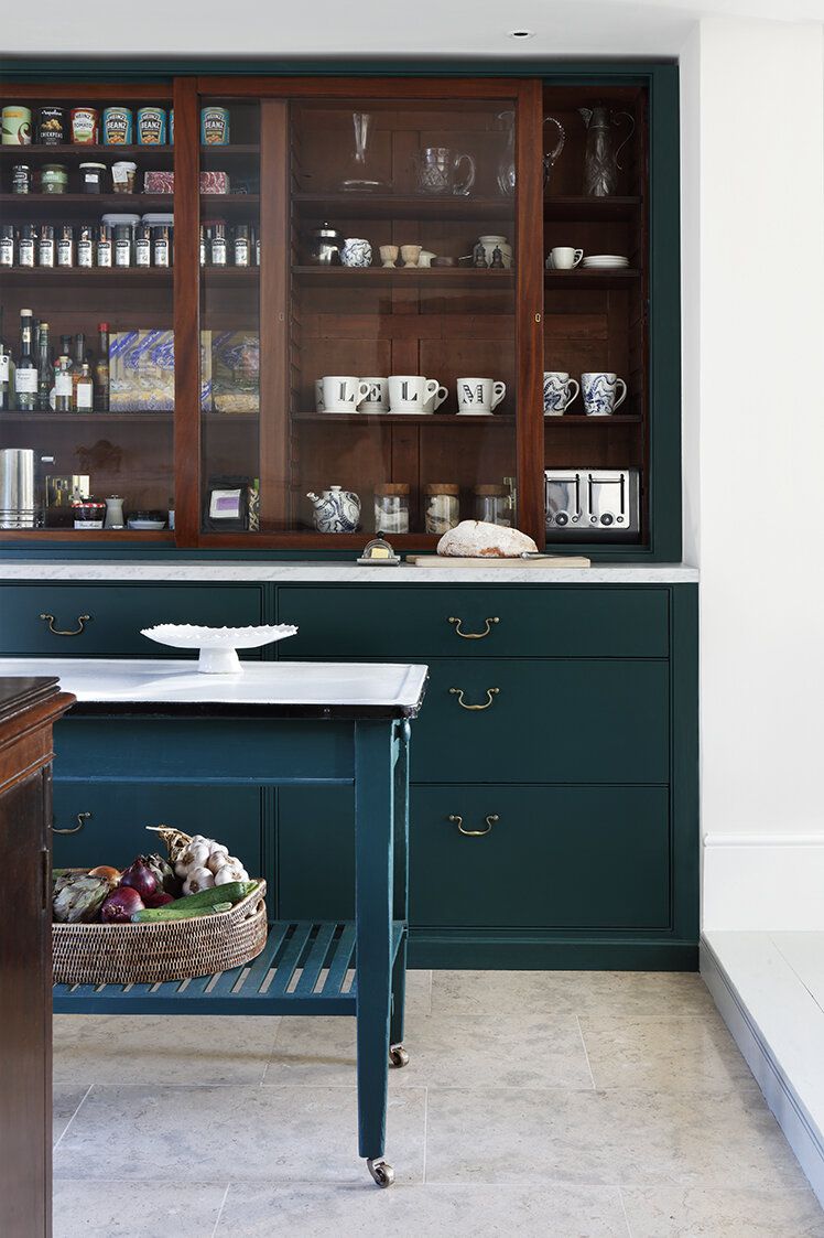 how to style glass front kitchen cabinetry