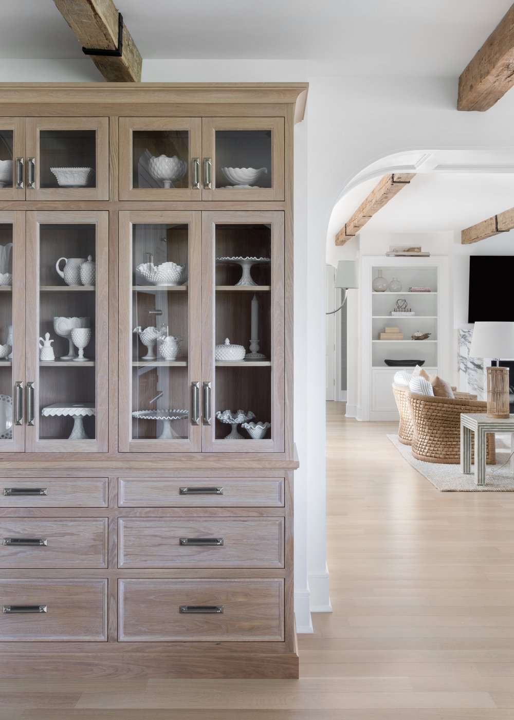 how to style glass-front kitchen display cabinetry