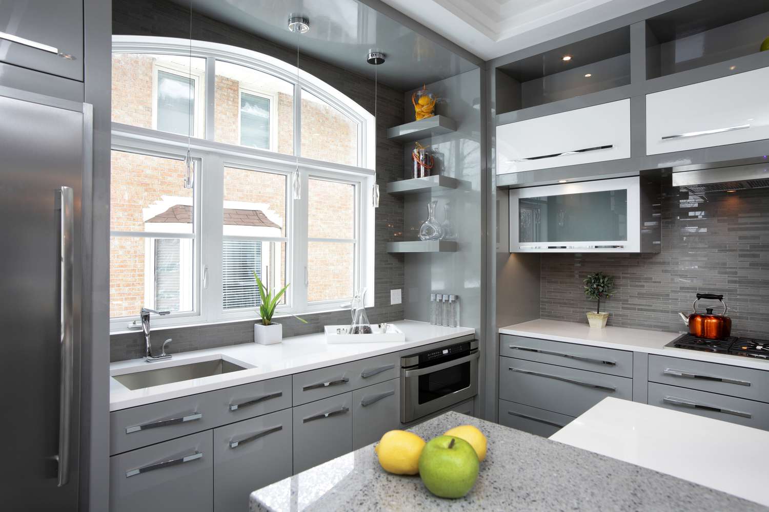 Gray on gray kitchen.