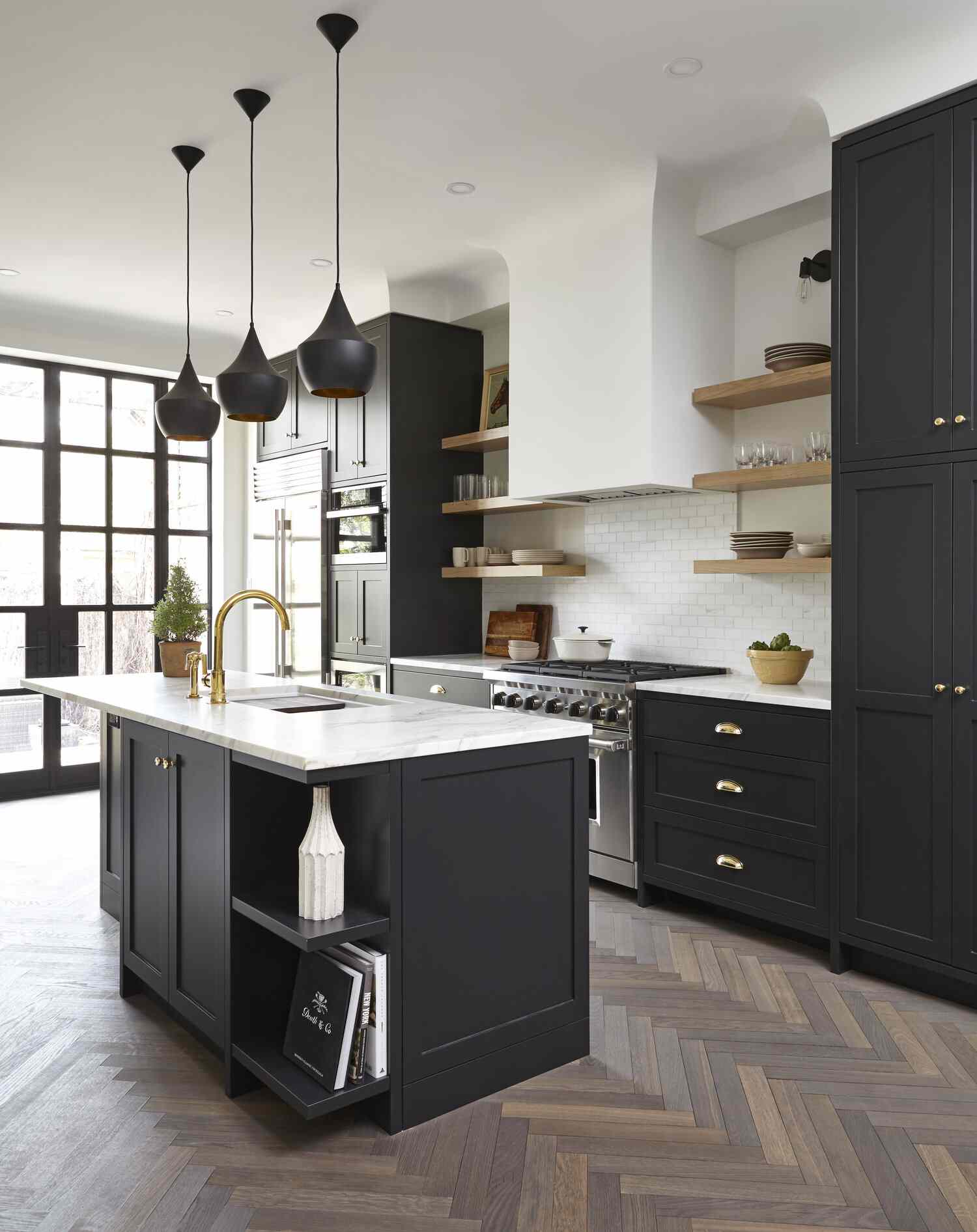 Black cabinets with subway tiles