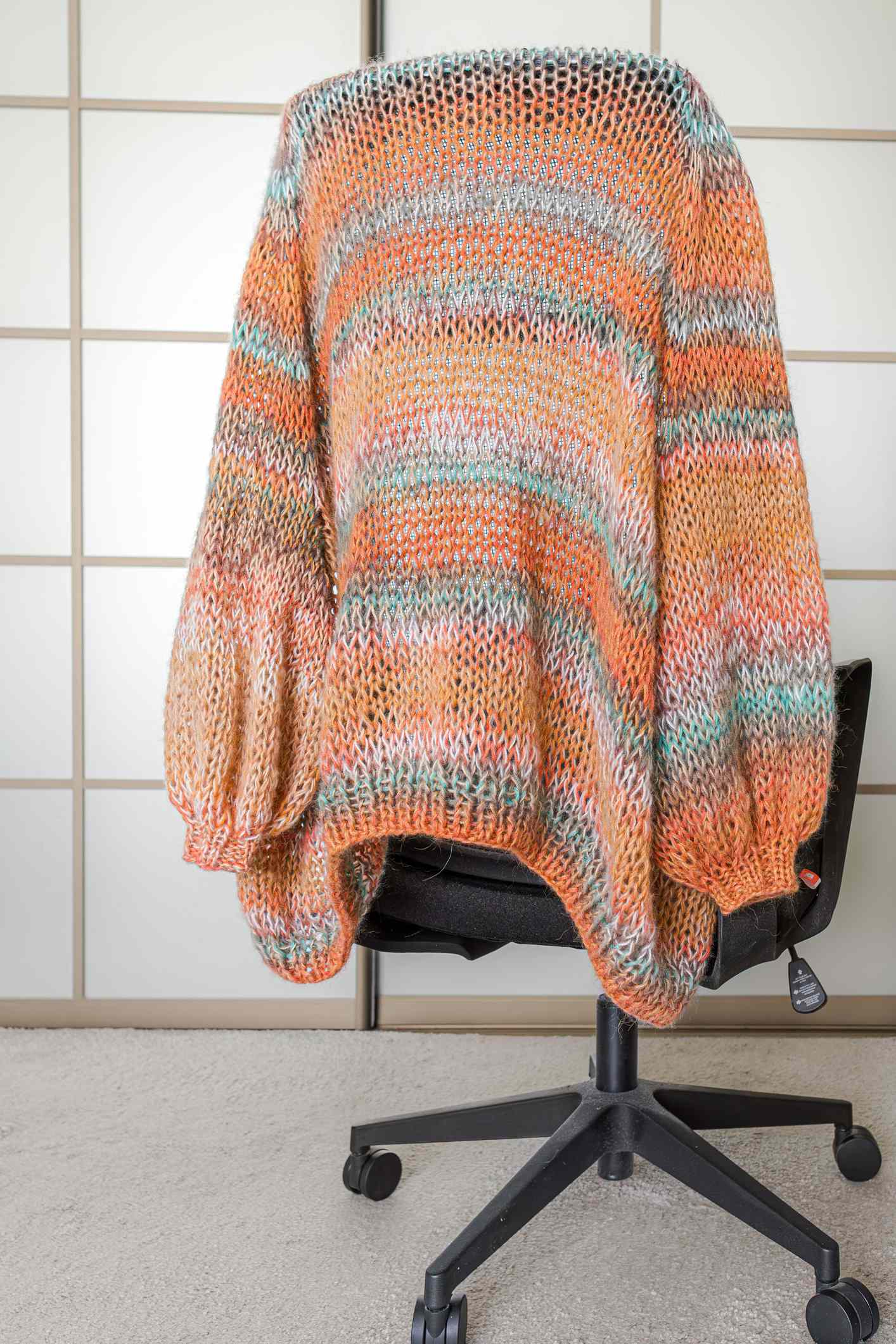 sweater on office chair
