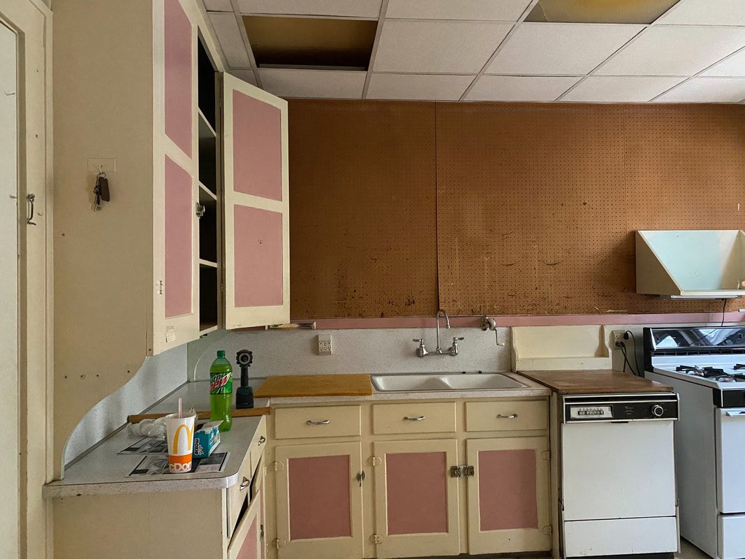 An outdated kitchen that needs to be gutted